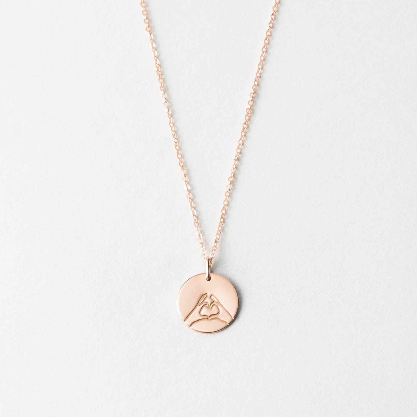 GLDN Micro Heart Locket Necklace Sterling Silver / Minimal