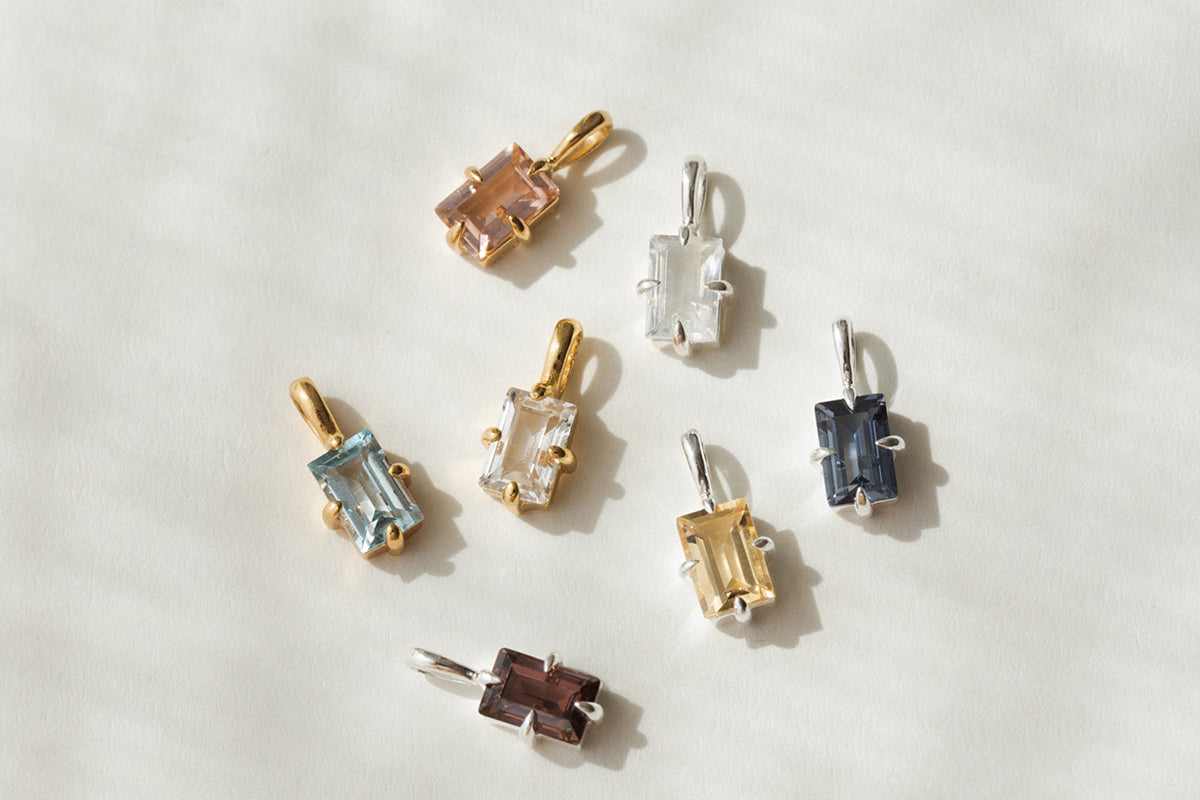 birthstone charms in gold, silver, and vermeil