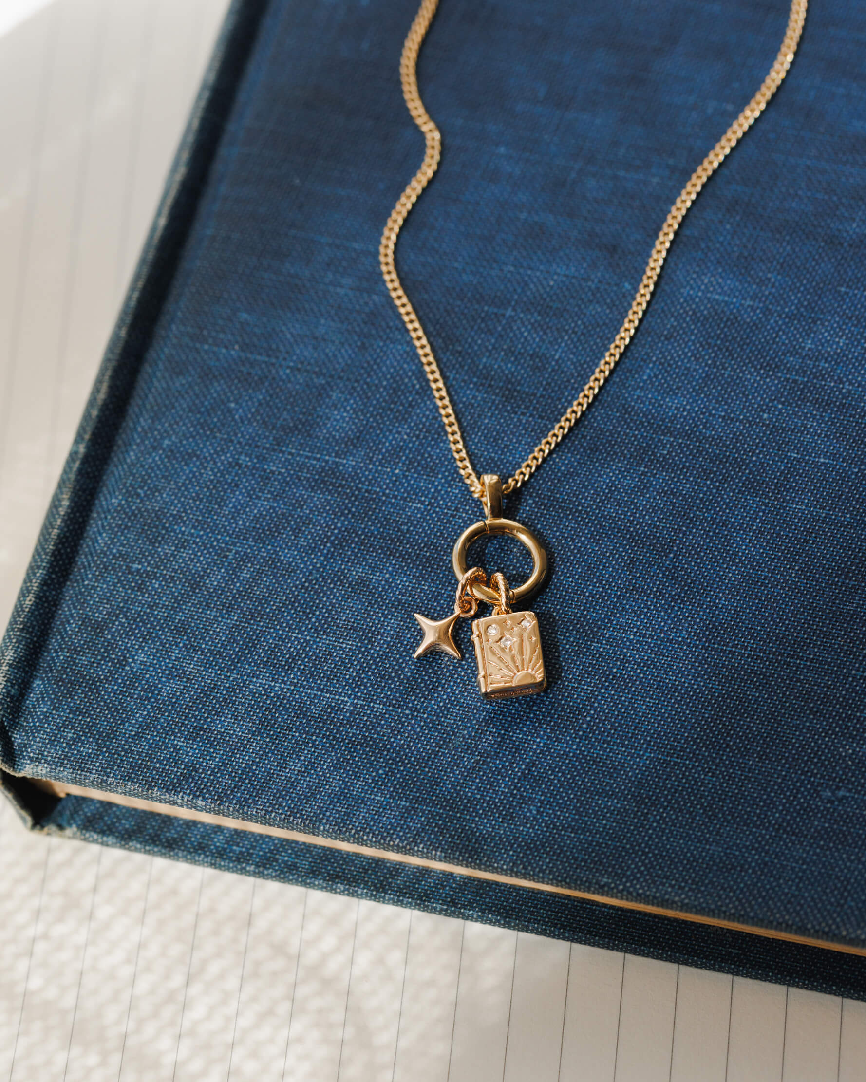Cosmic Unfolding Book Charm