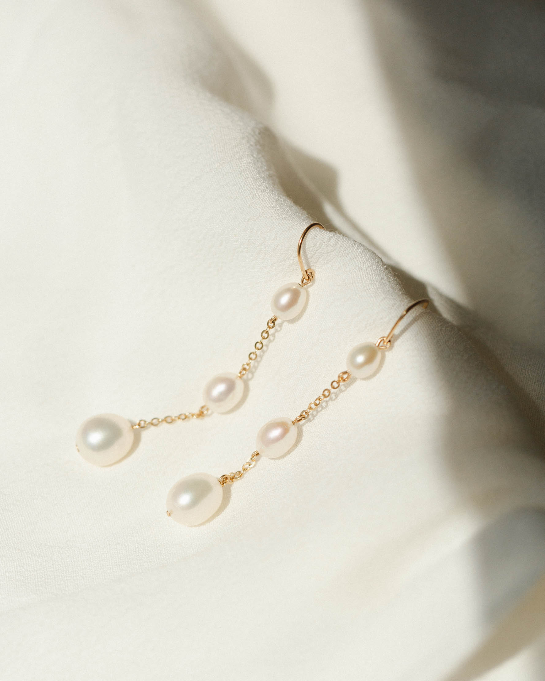Long Pearl Dangle Earrings In White Gold | KLENOTA