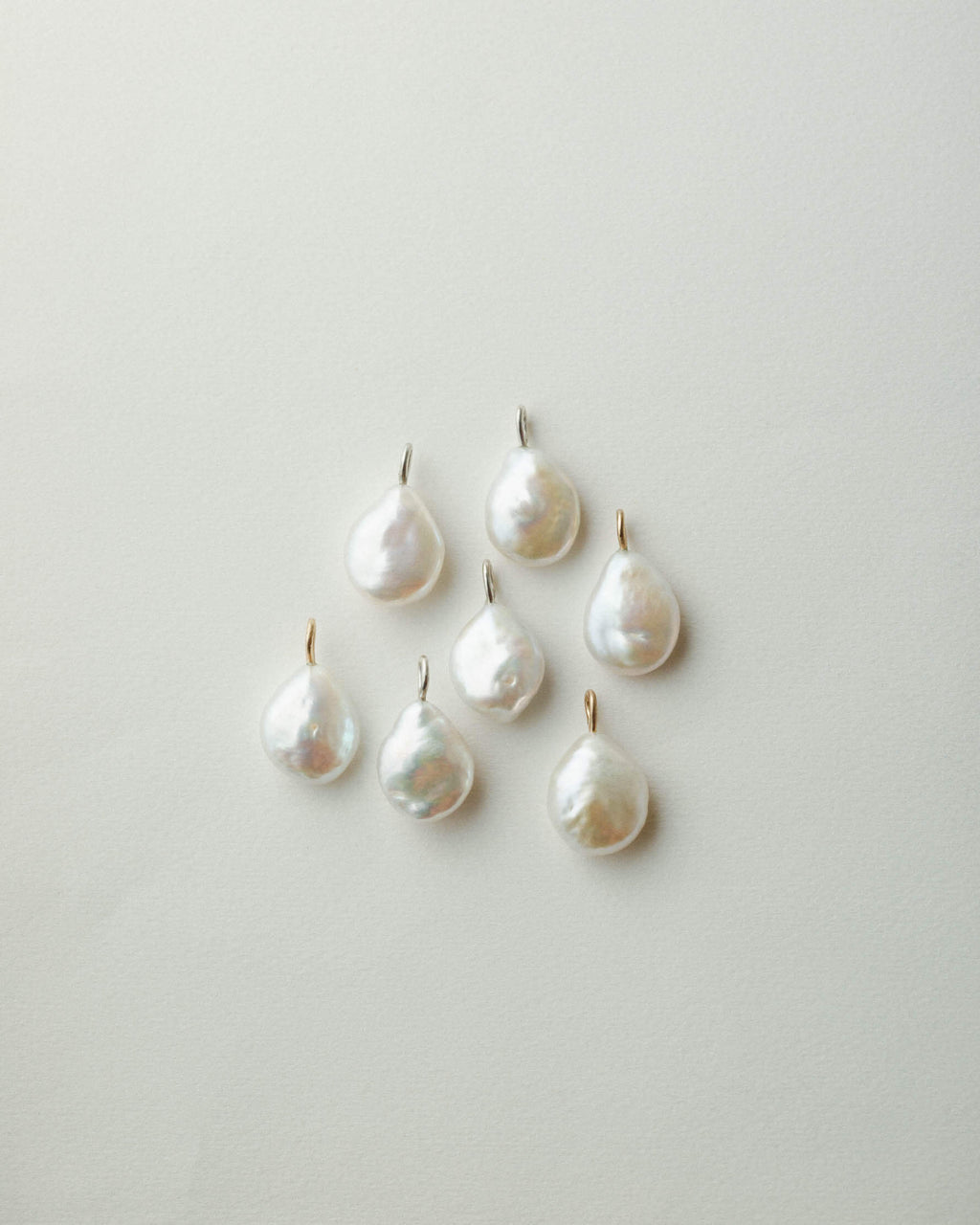 GLDN baroque pearl pendants.