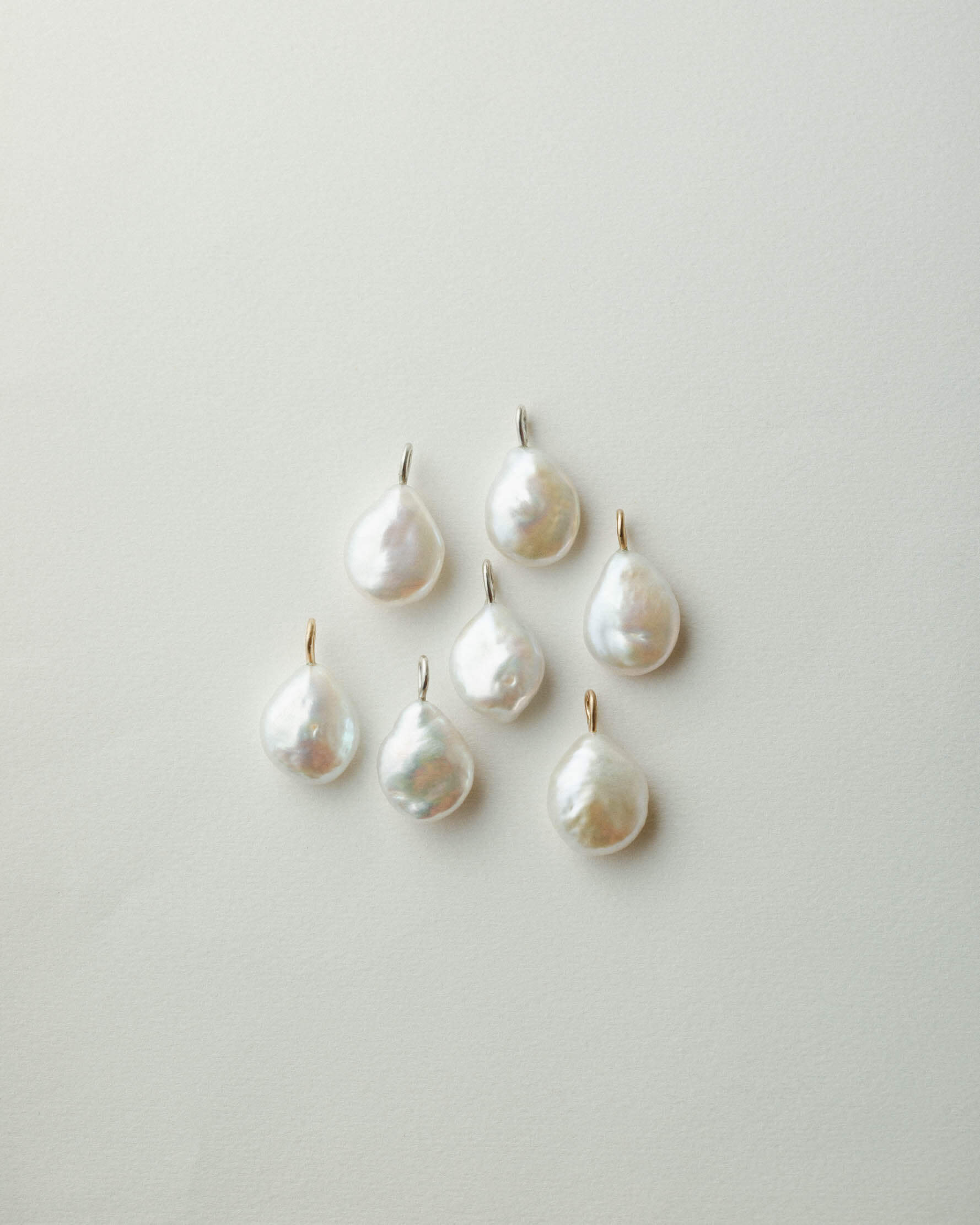 GLDN baroque pearl pendants.