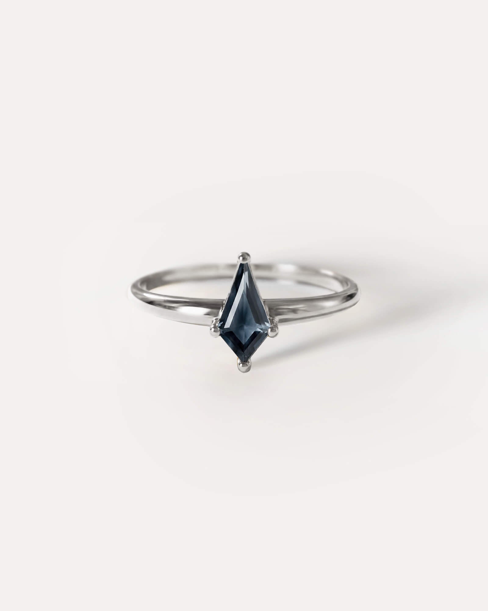 Sterling Silver ring with a marquise-shaped  Midnight Blue Sapphire  gemstone on a white background, plp_main; Material: Sterling Silver