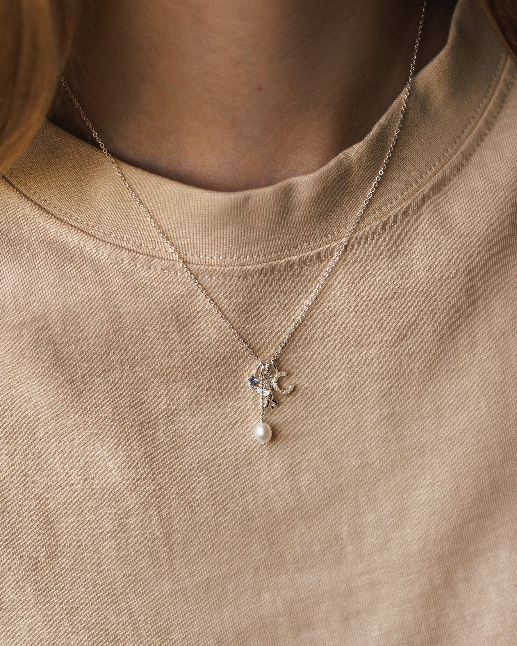 Suspended Pearl Charm
