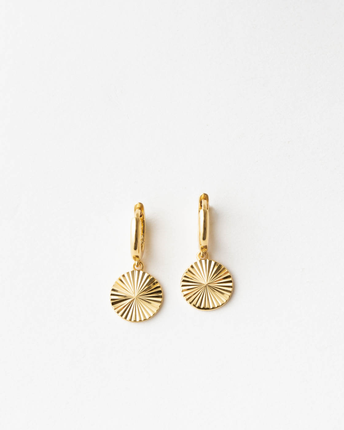 Radiant Charm Huggie Hoops — GLDN - Main Image